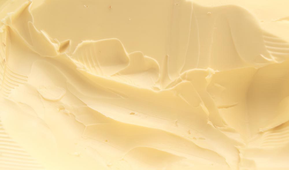 Closeup of a spreadable yellow butter.