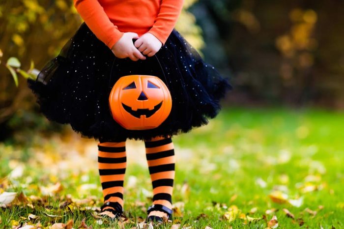 Young girl trick-or-treating