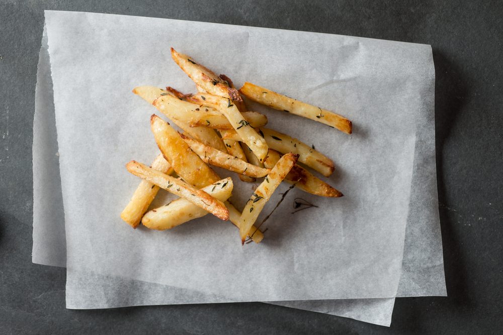 Overhead shot of baked chips on a folded wax paper