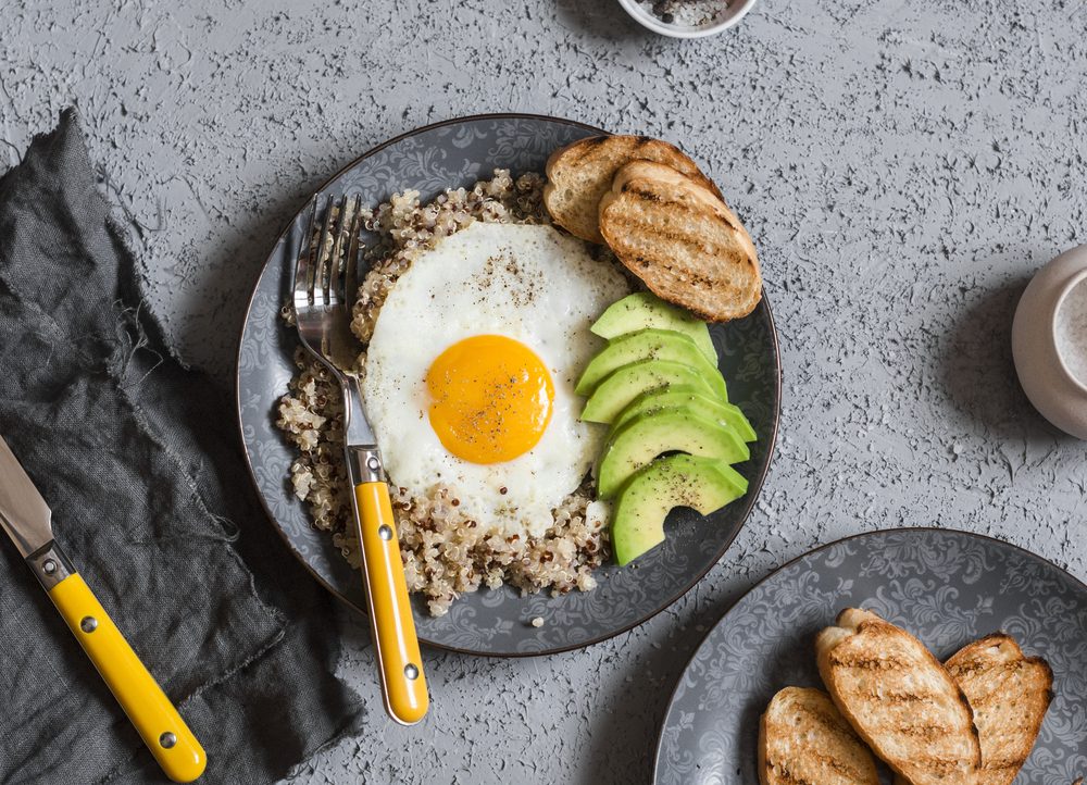 Quinoa and egg breakfast bowl. Healthy breakfast or snack. Top view, flat lay 