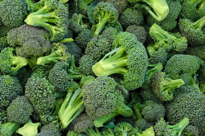 Broccoli in a pile on a market