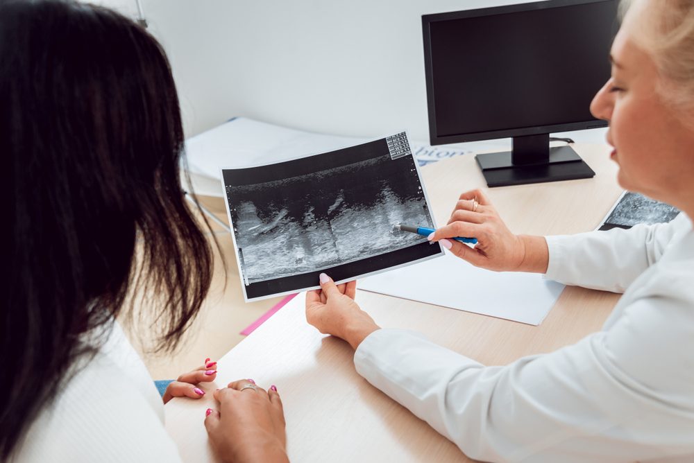 doctor and patient looking at image test