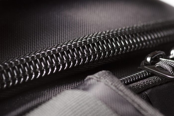 Zipper black bag backpack textile accessories macro