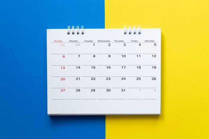 close up of calendar on the colorful table, planning for business meeting or travel planning concept