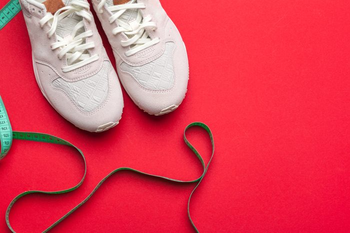 Pair of sport shoes on colorful background. New sneakers