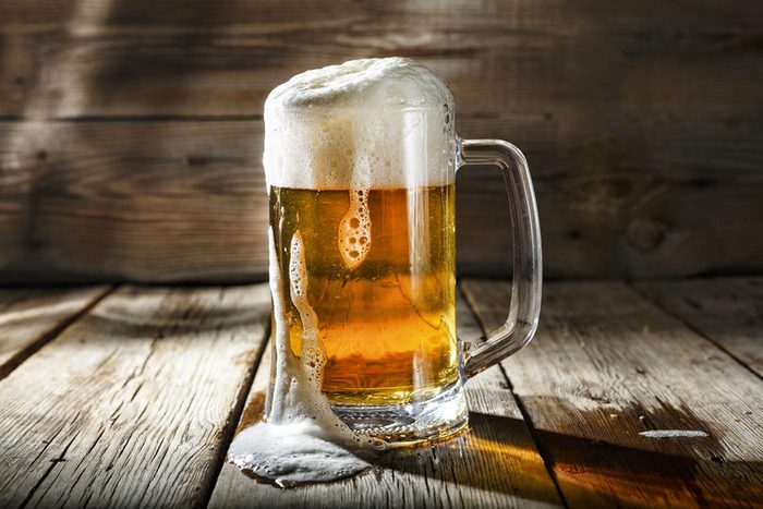 Mug of light beer with foam