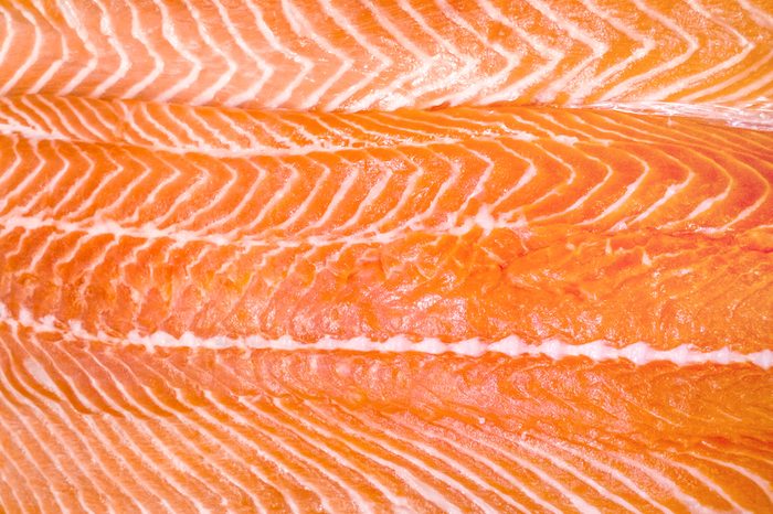 close-up of raw salmon fish fillet