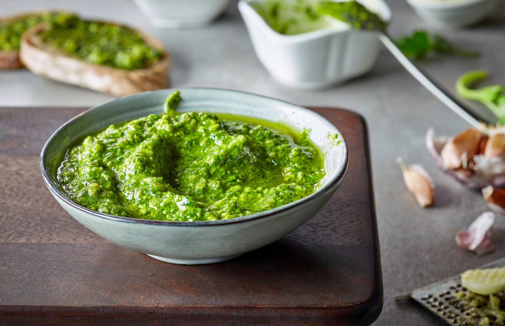 bowl of basil pesto, selective focus