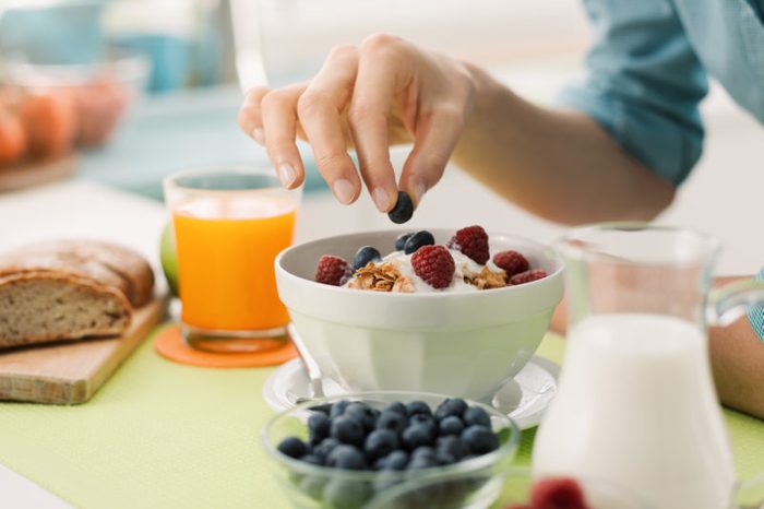 woman making a healthy breakfast