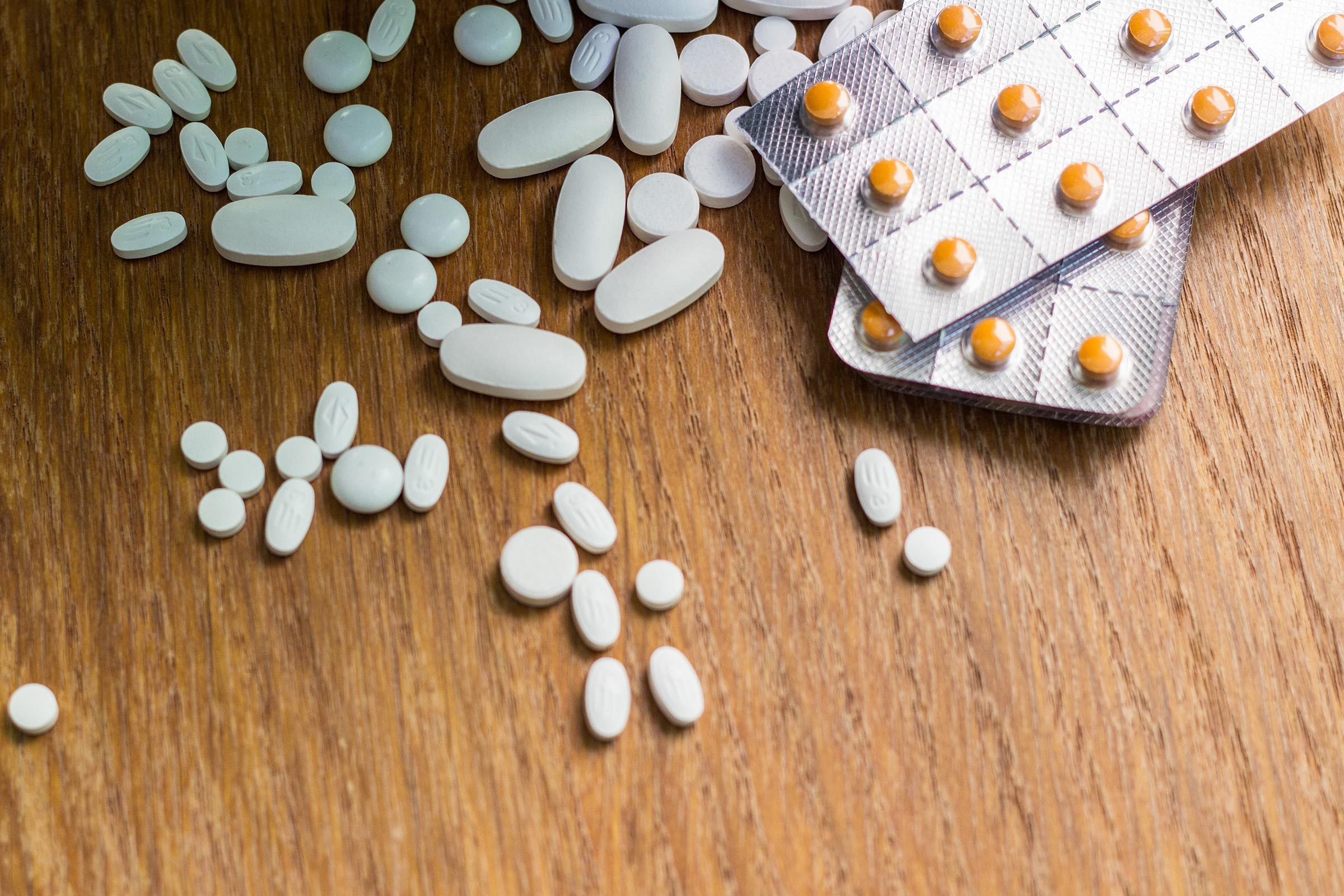 pills wooden table