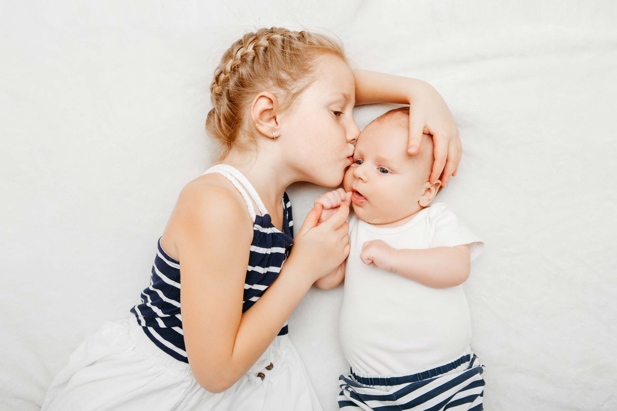 older sister with baby