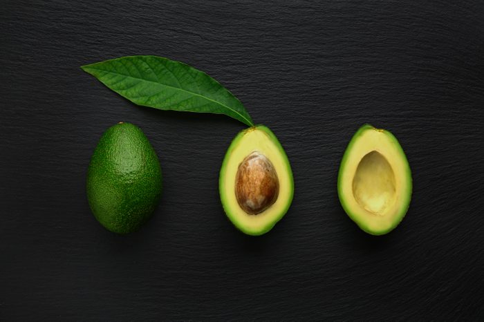 Fresh avocado on dark background