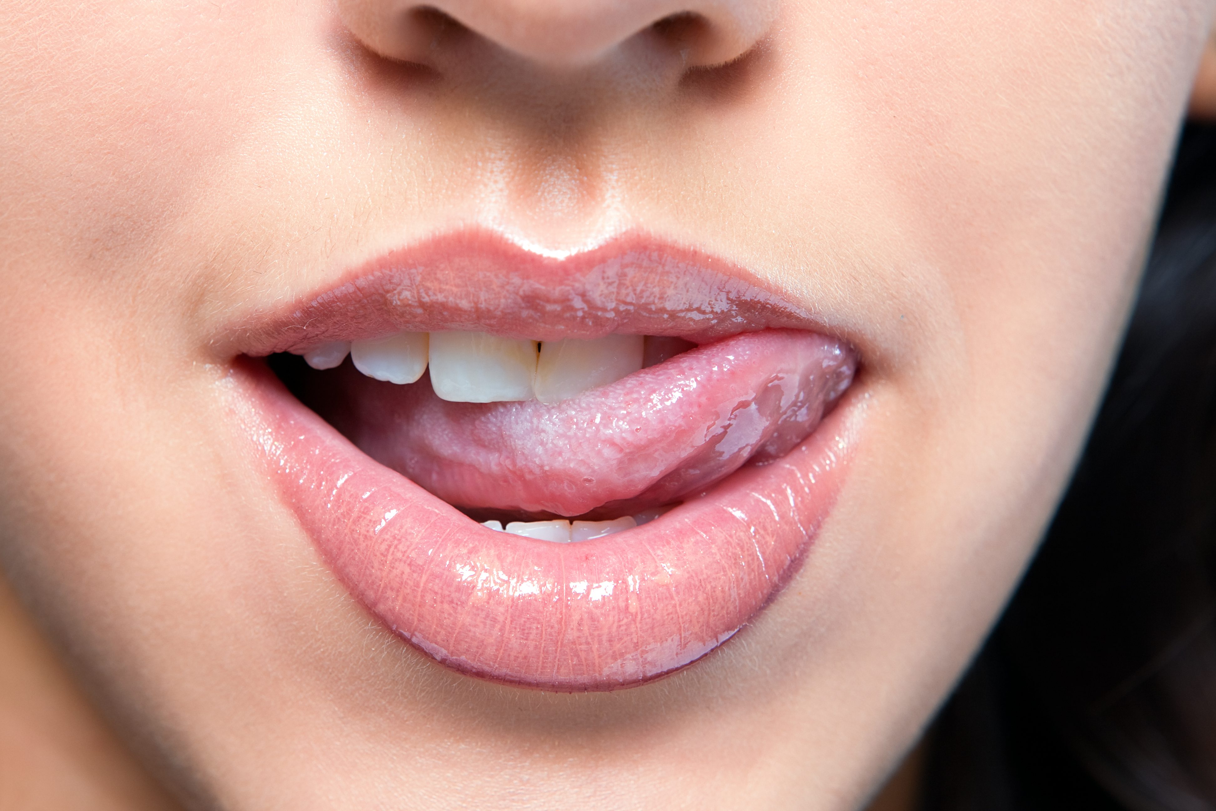 Close up a smiling mouth of the girl