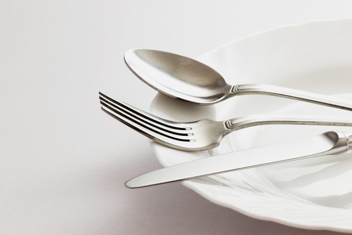 Fork, Spoon and Table Knife on the white background