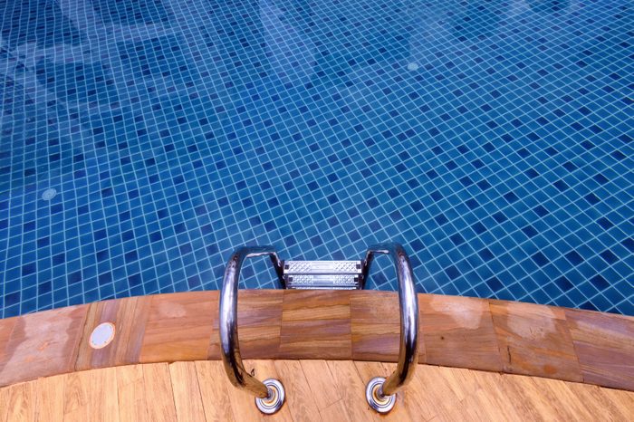 Pool ladder in swimming pool