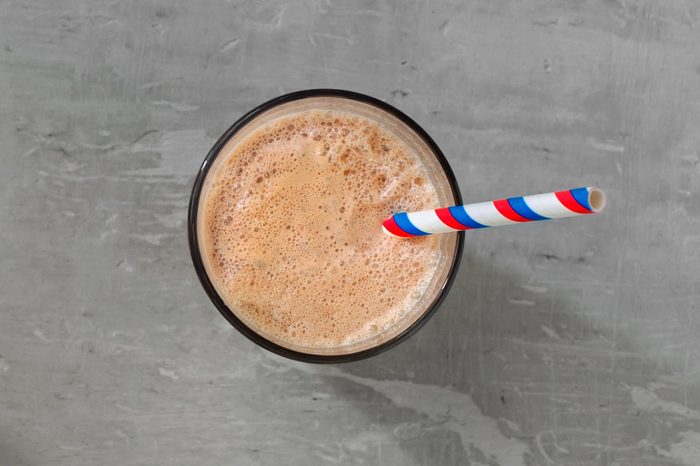 Two chocolate milkshake on a light surface, top view