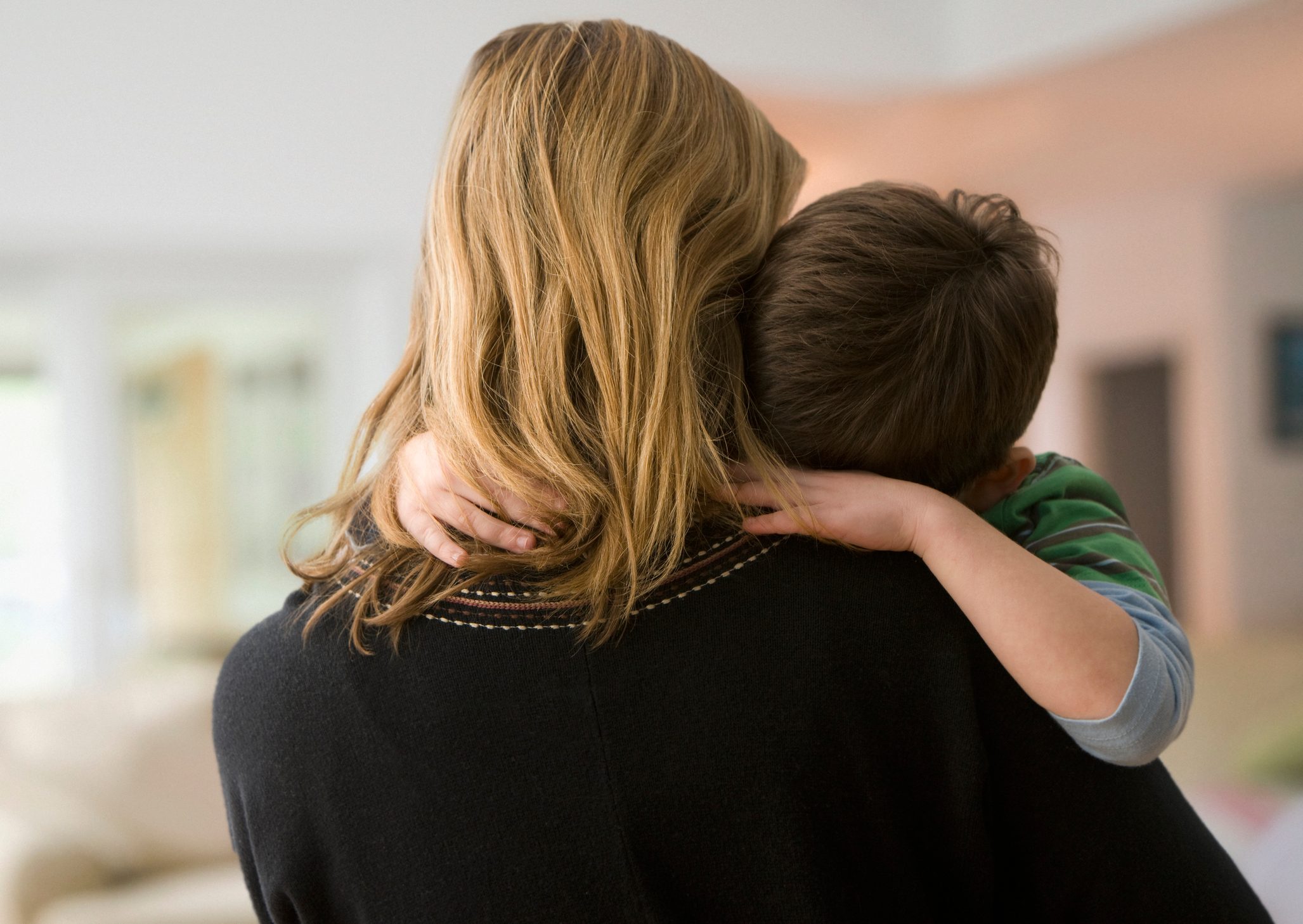 mother hugging son