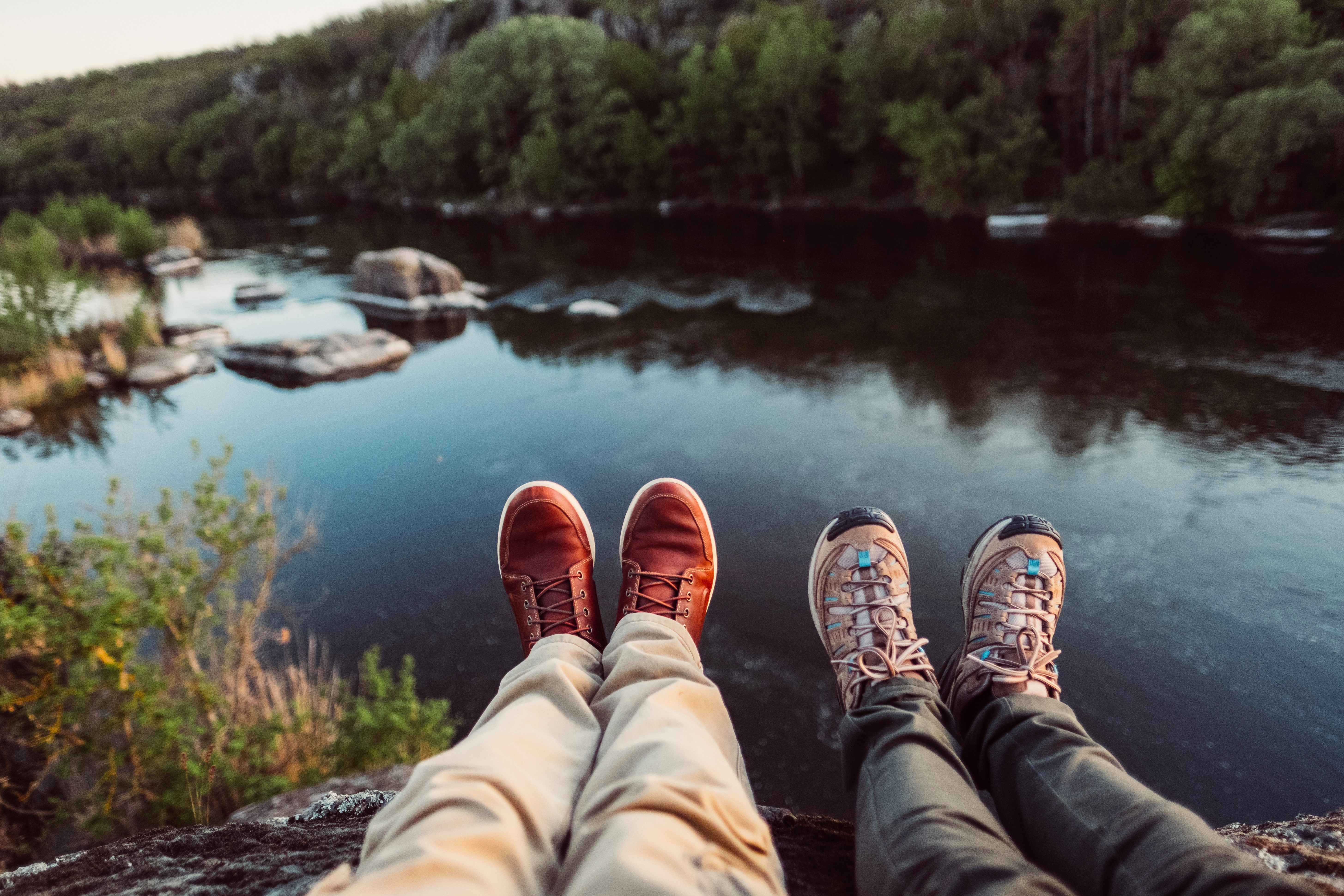 boots overlooking Mountain View lake love couple hiking mental health