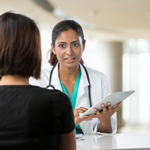 woman doctor tablet diverse health