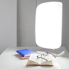 light therapy lamp on desk