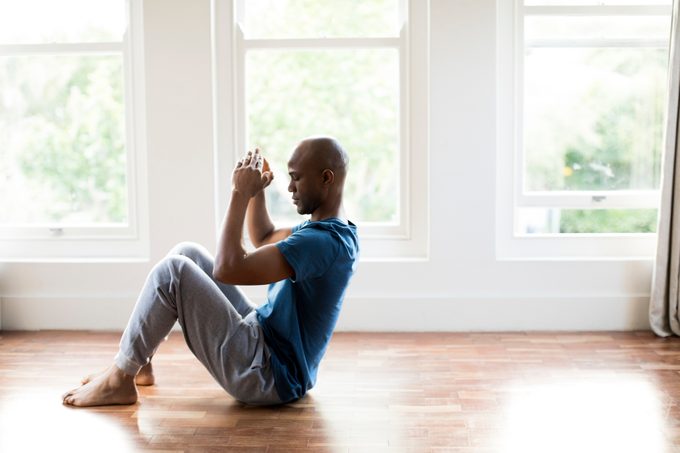 man exercising at home