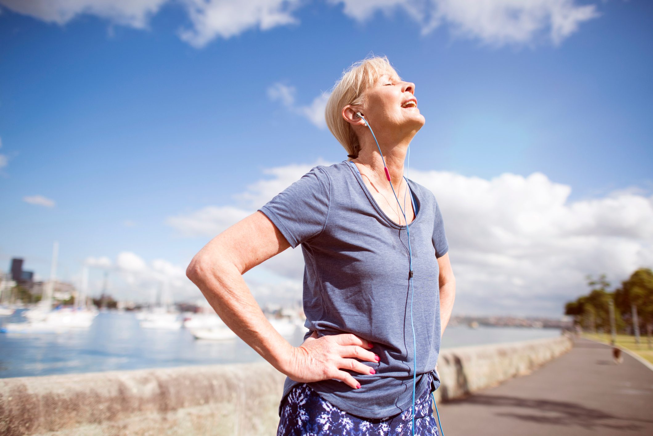 older woman exercising outsiee