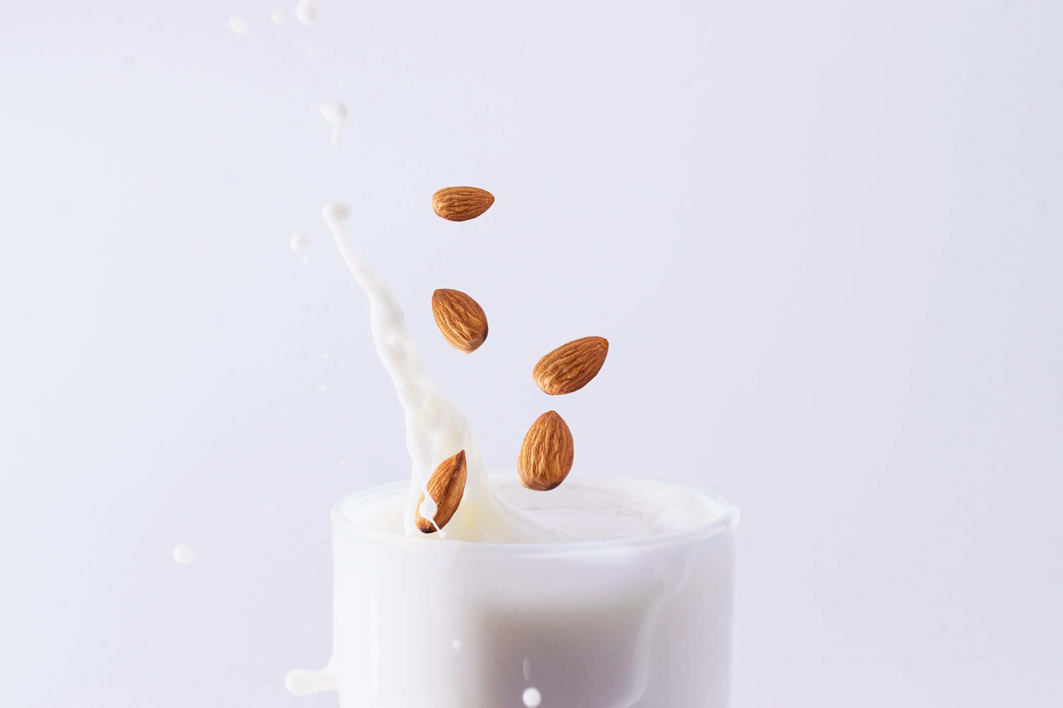 almonds splashing in milk