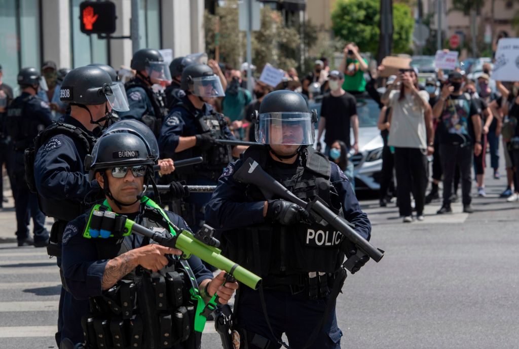 police officers armed with rubber bullet launchers in los angeles california