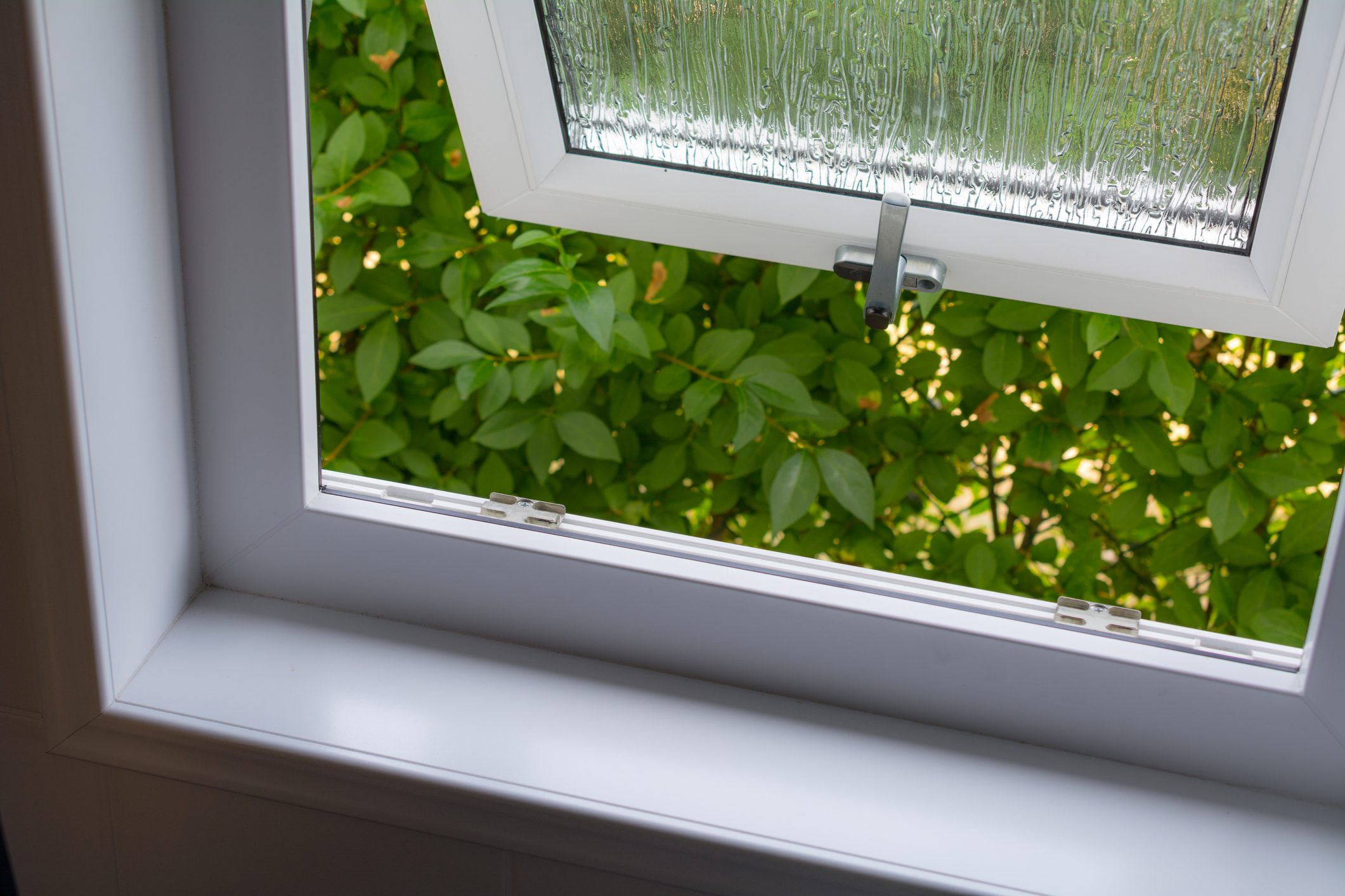 bathroom window propped open