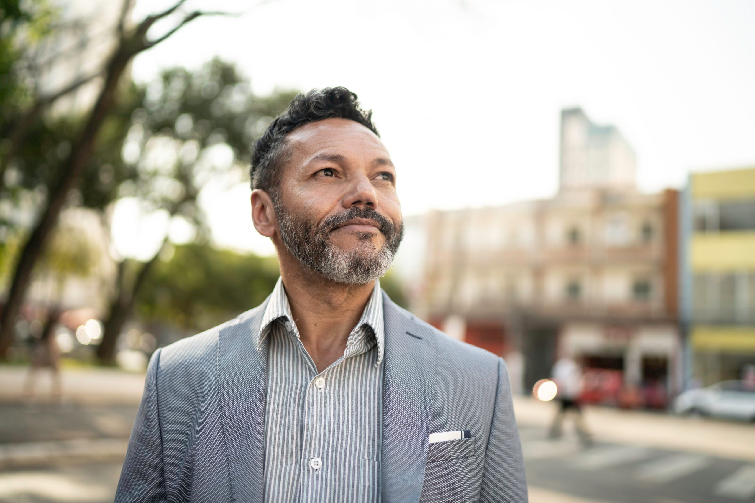 businessman looking away on the street