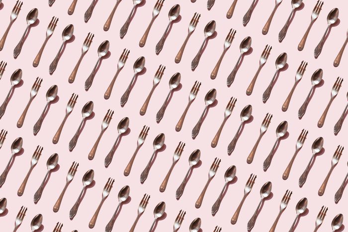 spoon and fork pattern on pink background