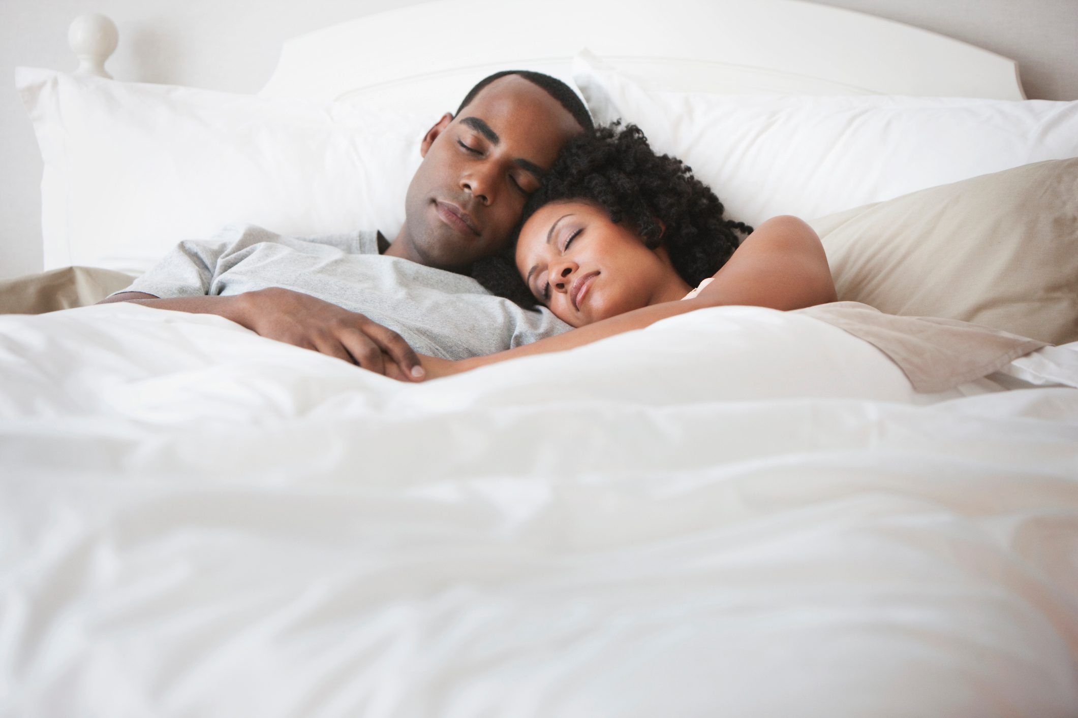 Couple sleeping in bed