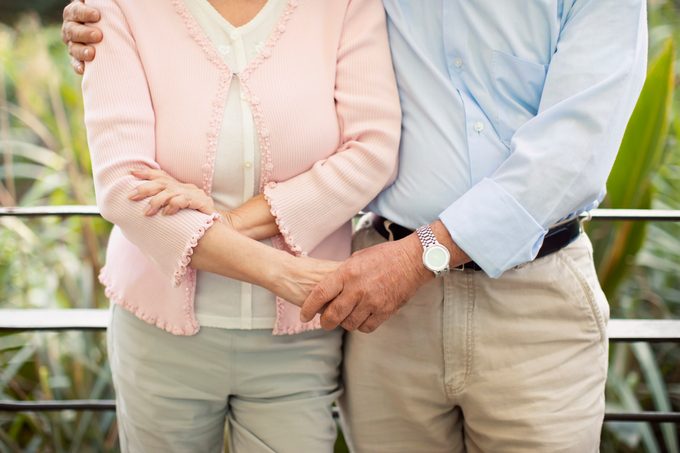 cropped close up shot of couple hugging