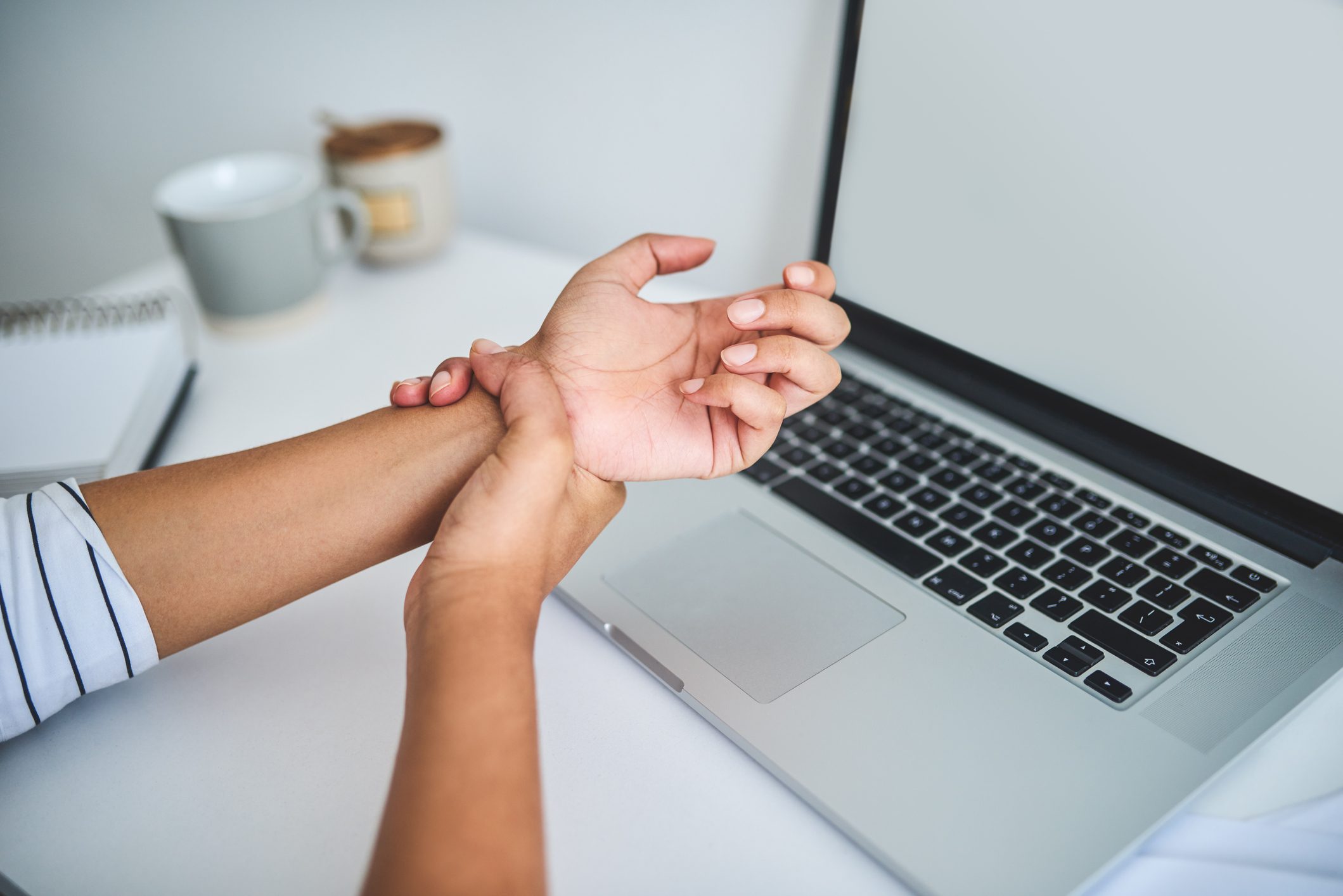 close up of woman suffering from carpal tunnel syndrome