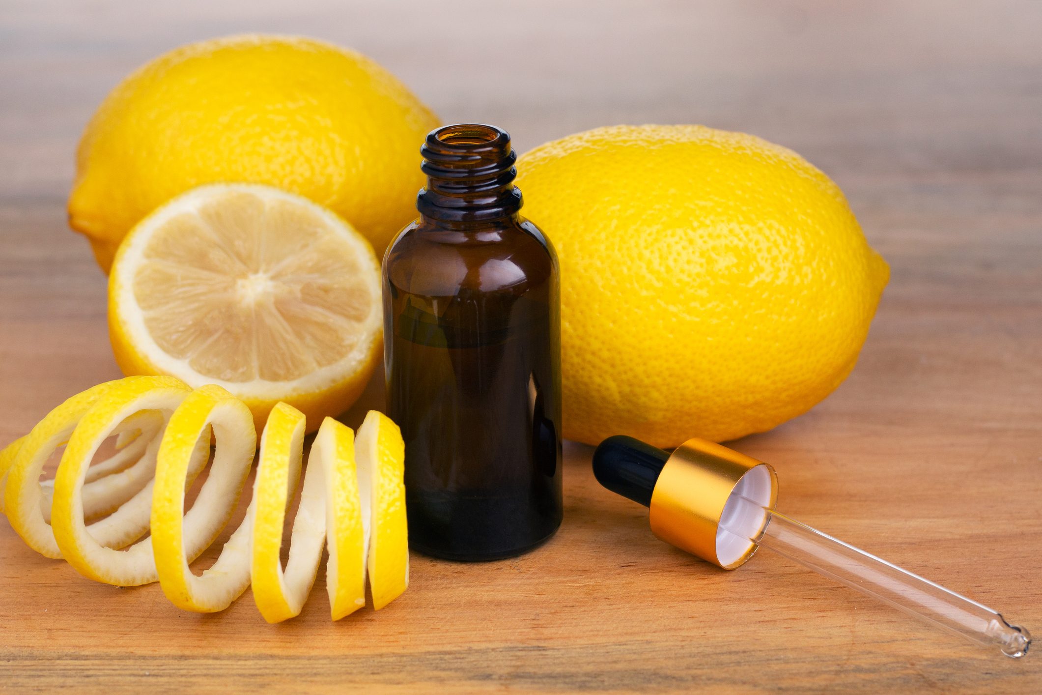 Lemon Essential Oil In A Bottle Withlemon Essential Oil In A Bottle With Lemon On The Side