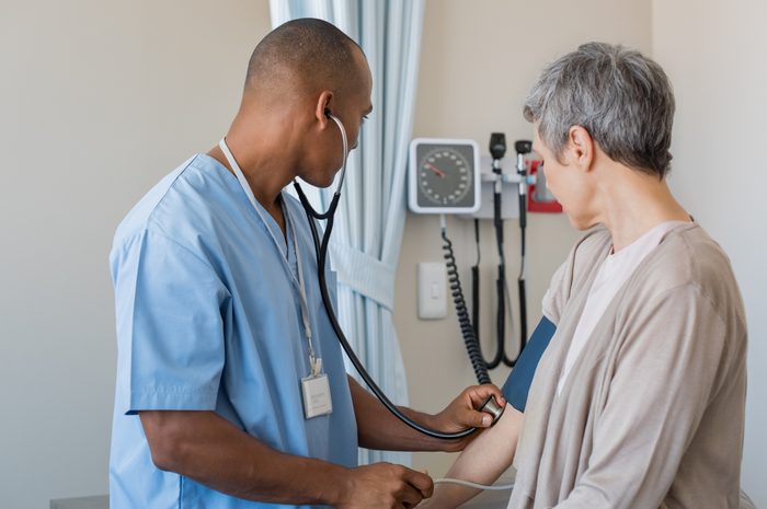 Nurse measuring blood pressure