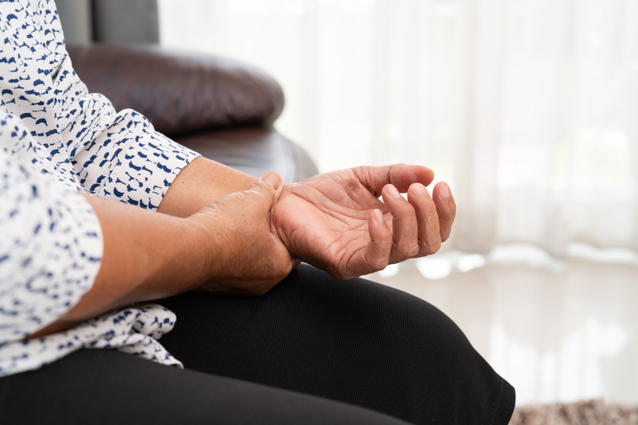 old woman suffering from wrist hand pain, health problem concept