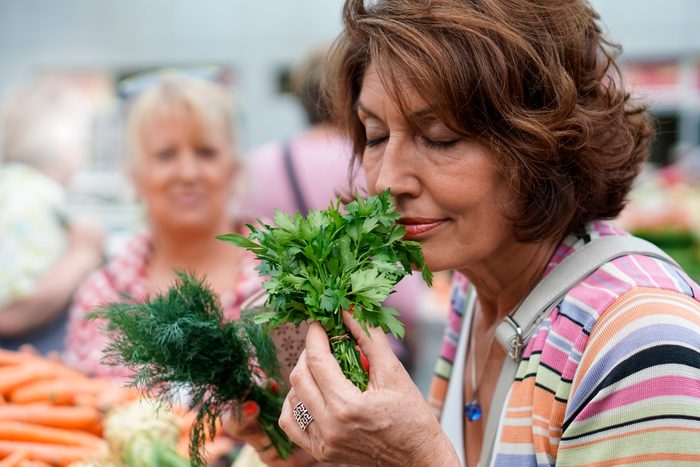 Senior female friends grocery shopping
