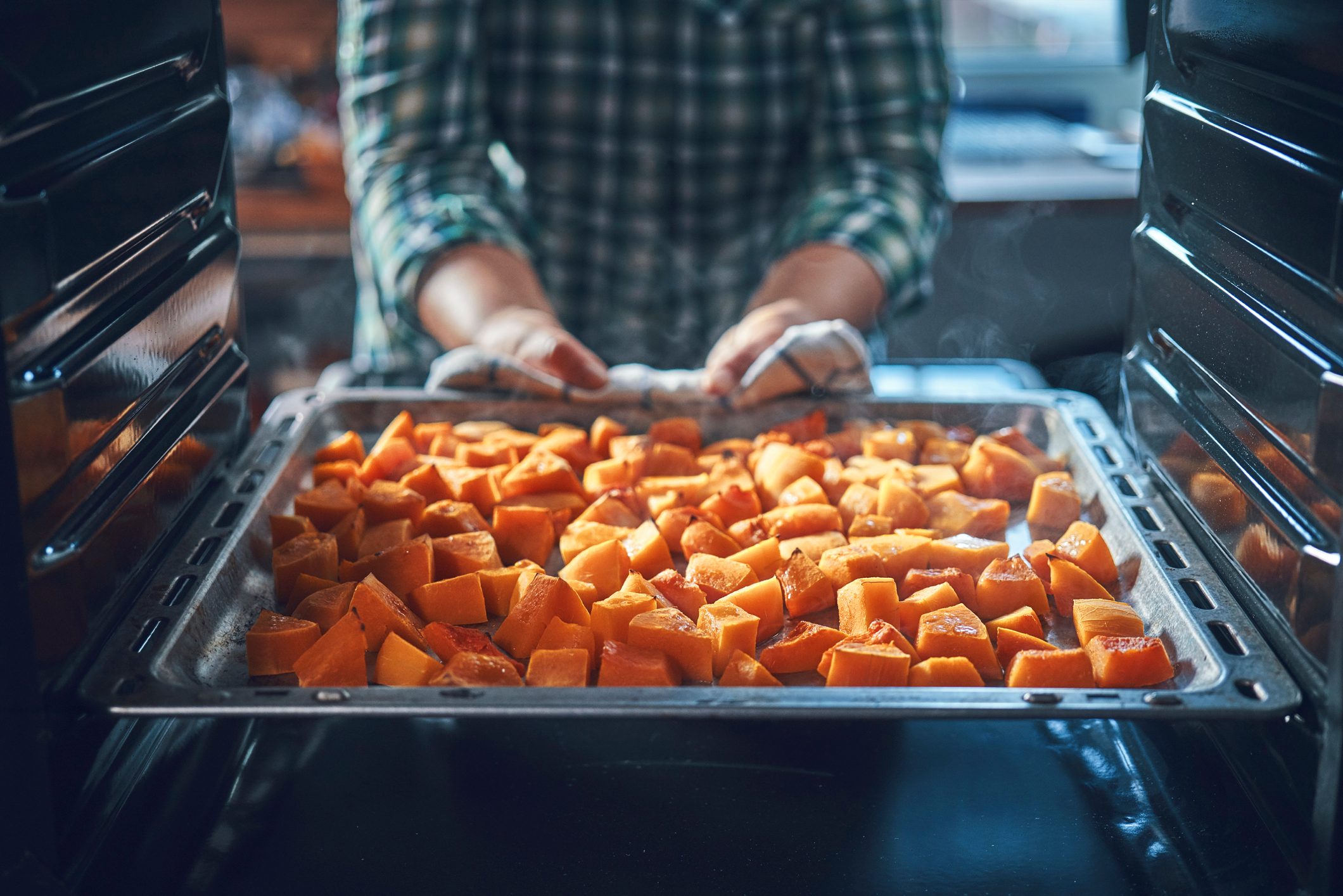 Cutting Fresh Pumpkins for Roasting in the Oven