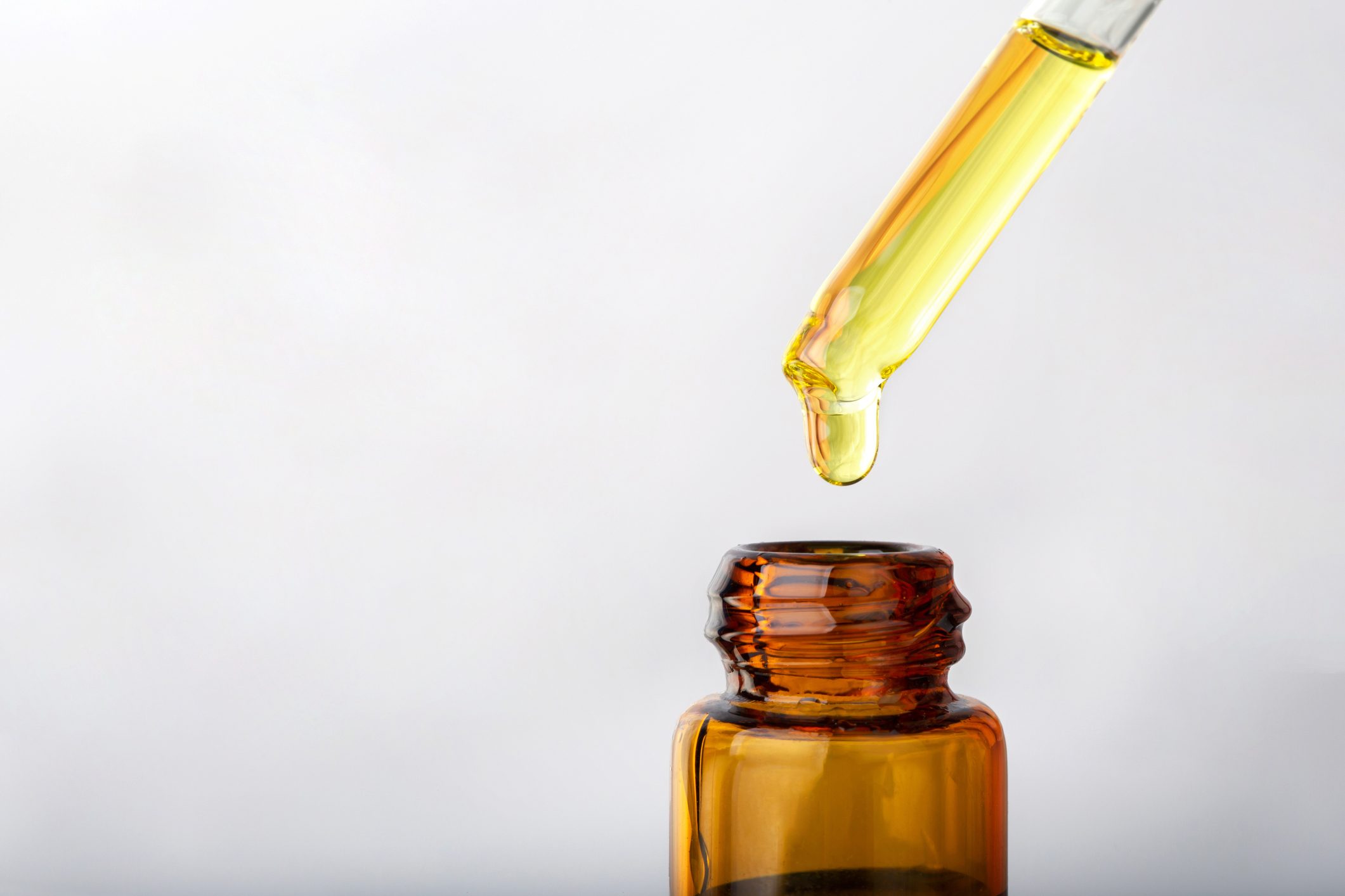 cbd oil in bottle with dropper