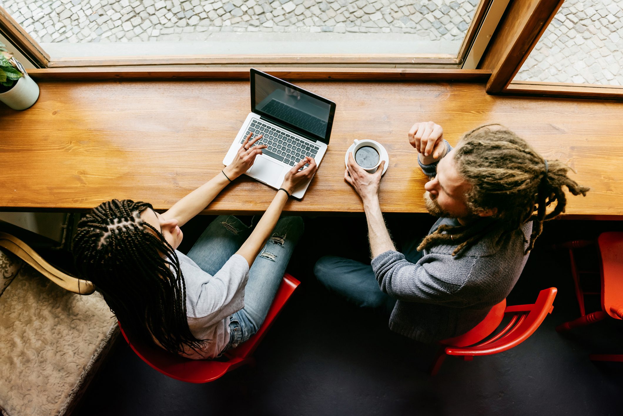 A young man and woman in a café