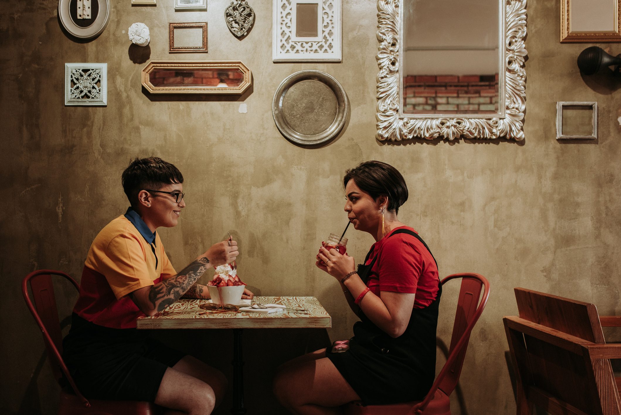 Two women on a date in cafe