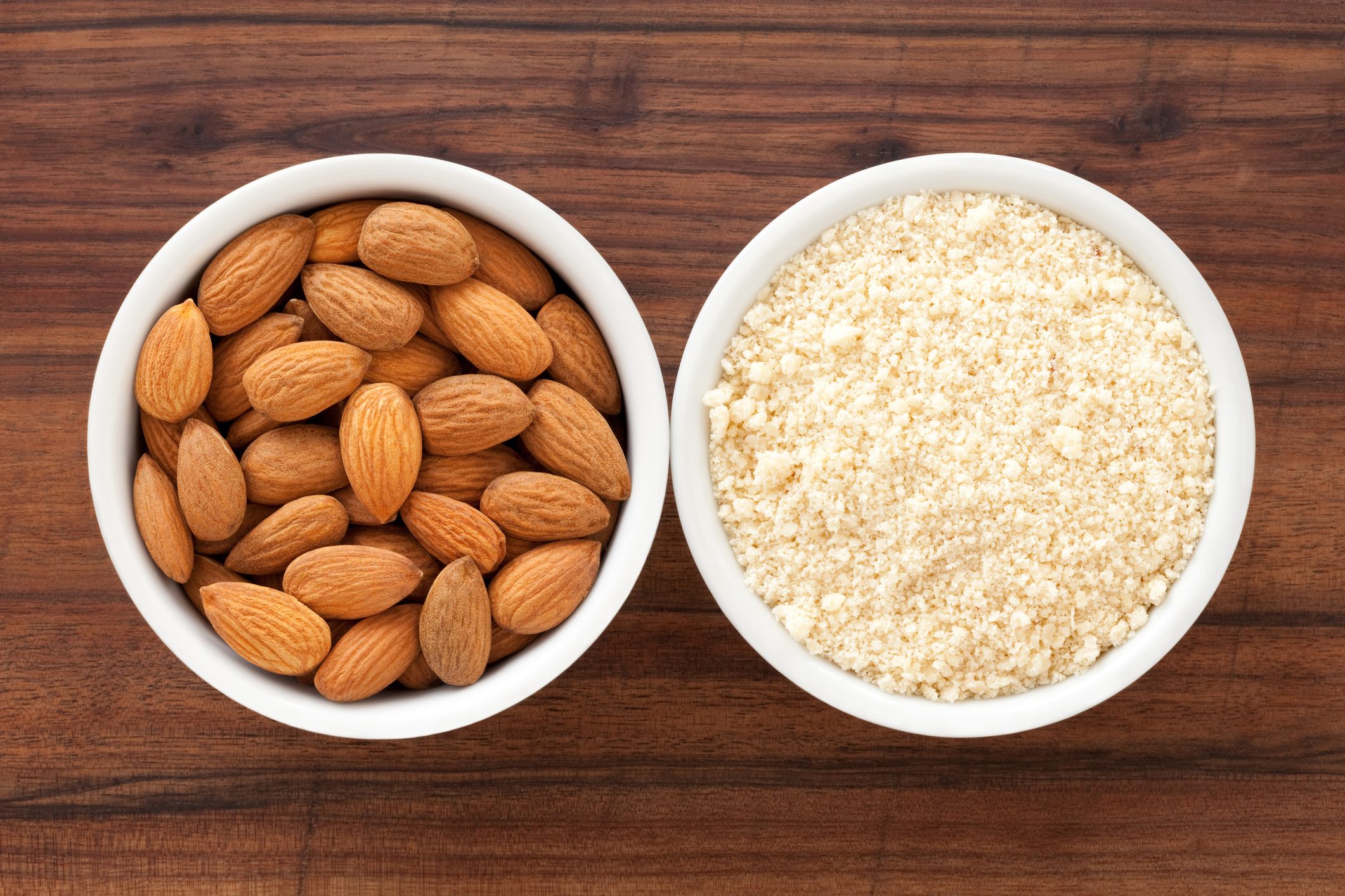 Almonds and almond flour in bowl