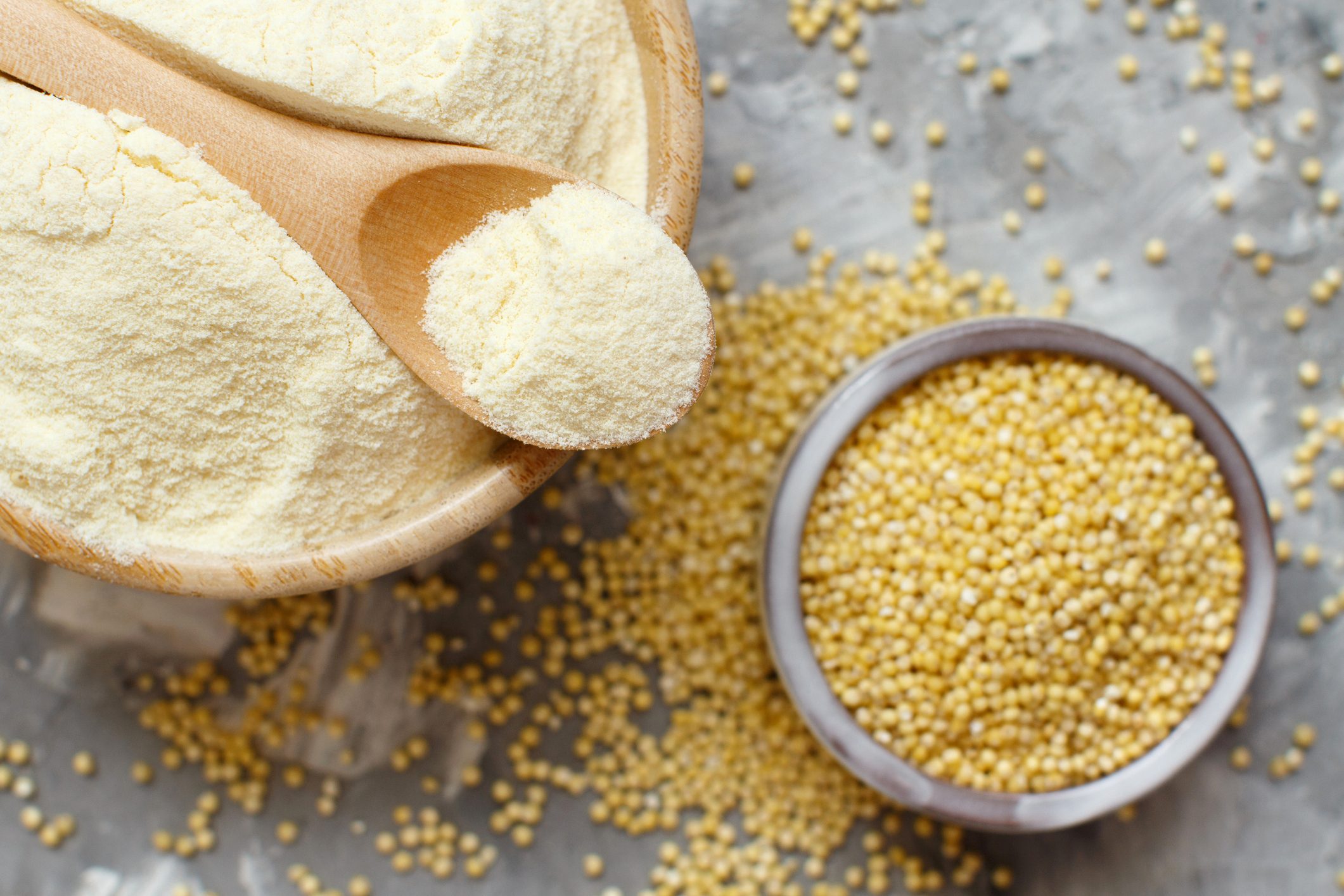 Hulled millet flour and grain top view