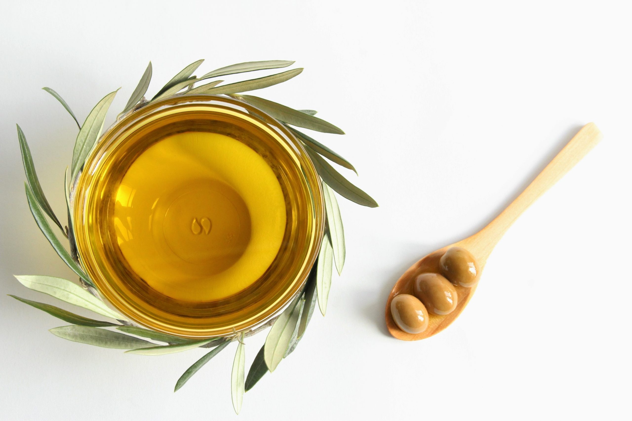 Olive tea With Olive Branch And Green Olives. Photo