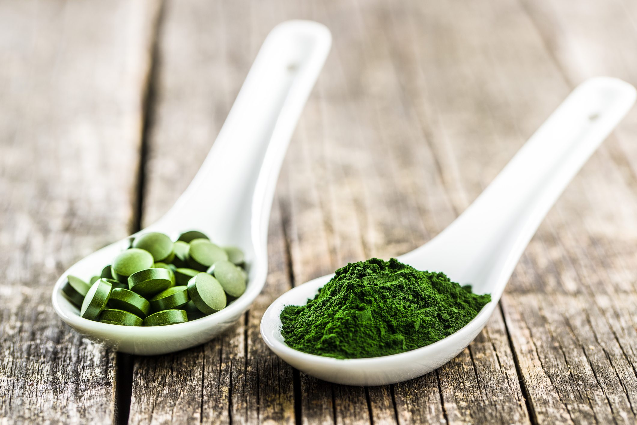 Green chlorella pills or green barley pills and powder.