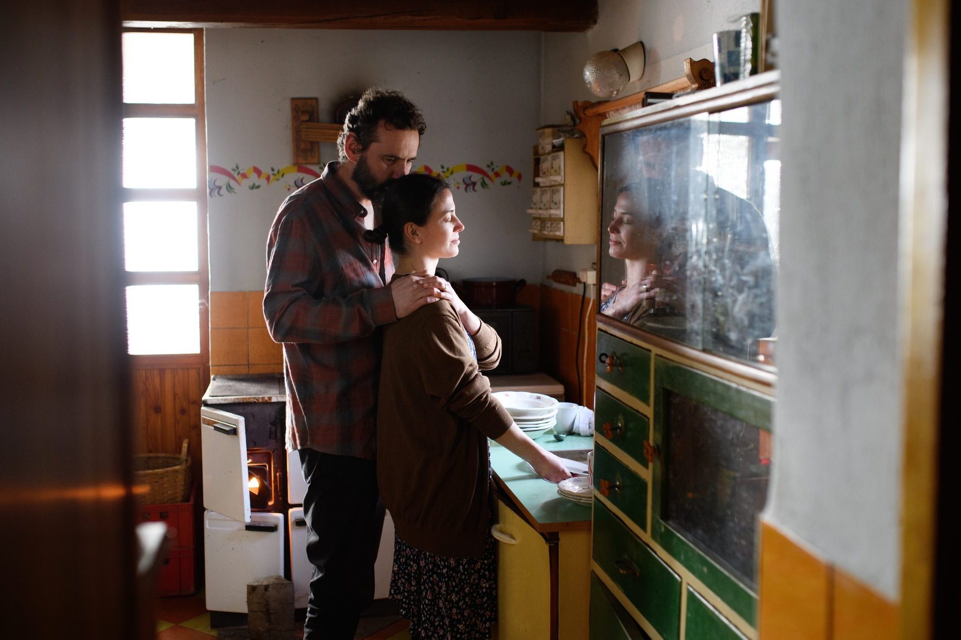 Portrait of sad poor mature couple indoors at home, poverty concept.