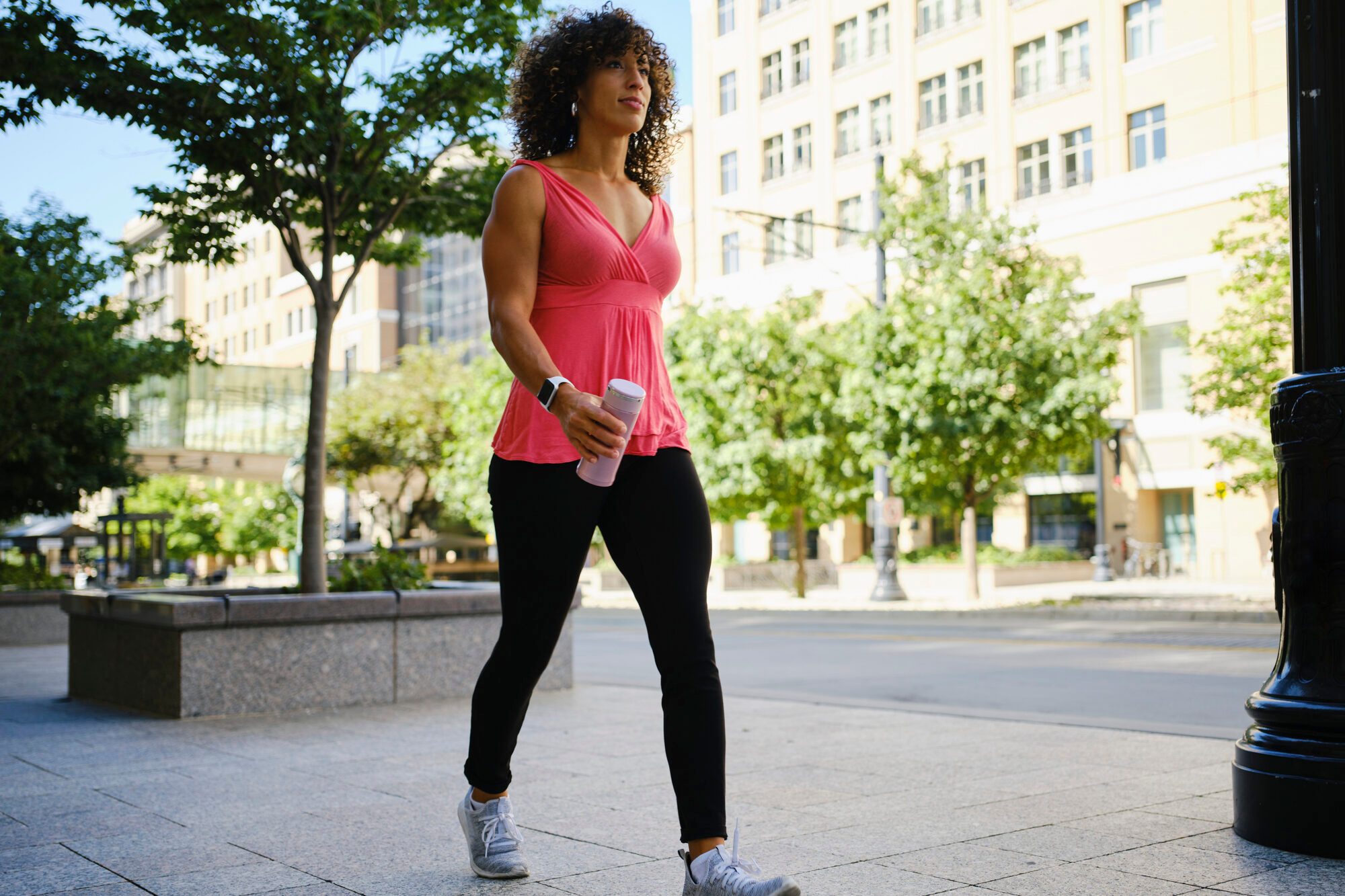 Young Adult Woman Walking outside for exercise