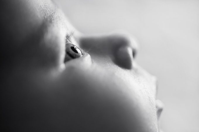 close up of baby's eye in black and white