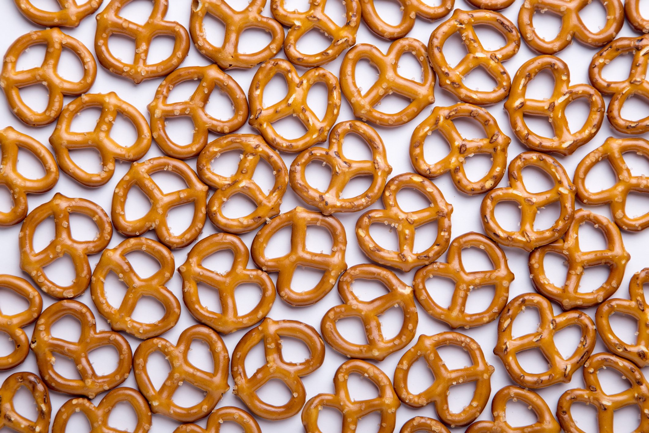 Full Frame Shot Of Pretzels Over White Background